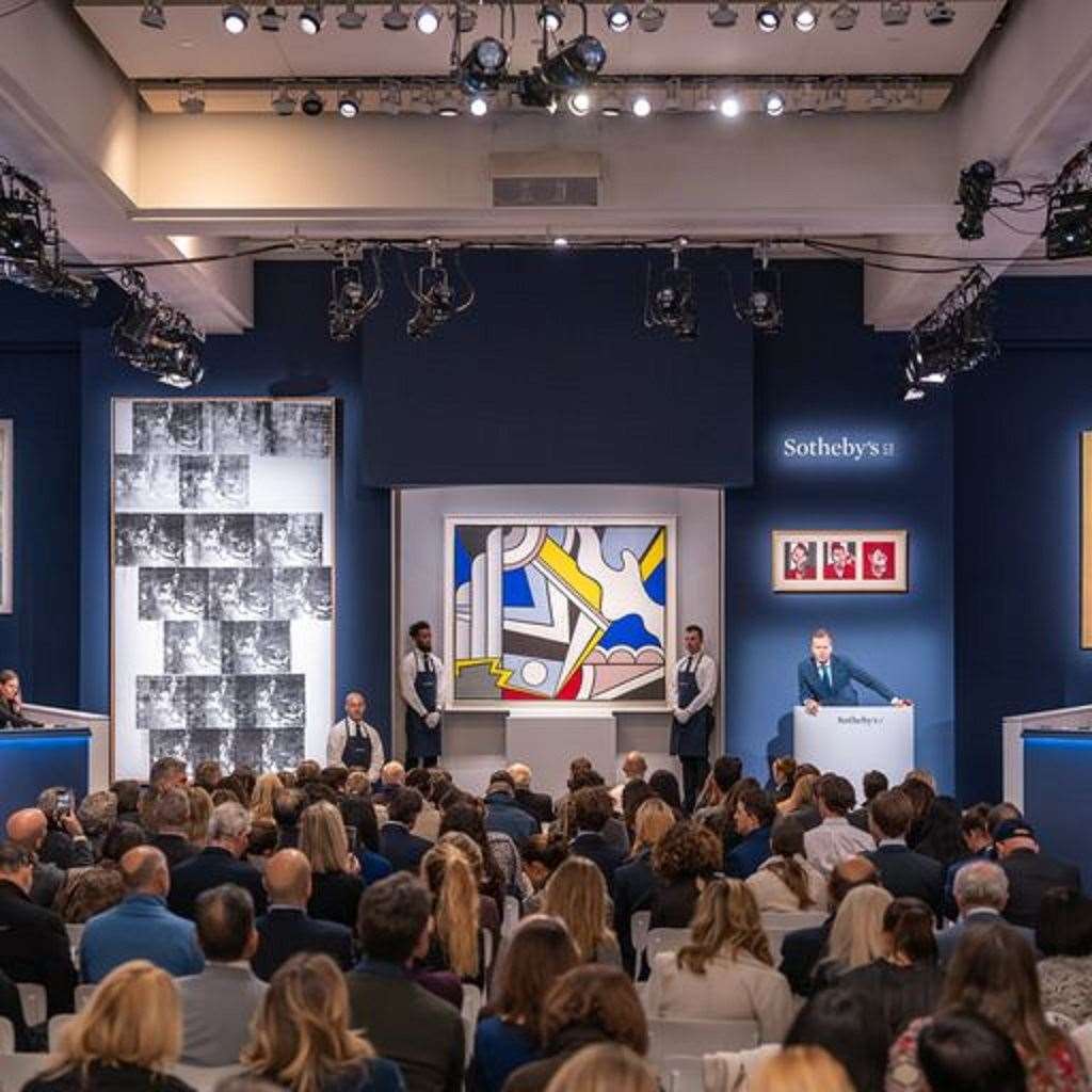 Warhol’s rare masterpiece White Disaster (White Car Crash 19 Times) (left) went under the hammer in New York on Wednesday (Sotheby’s/PA)
