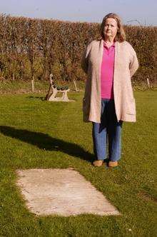 Janet Barton stands where the memorial bench was in Rodmersham Cricket Club