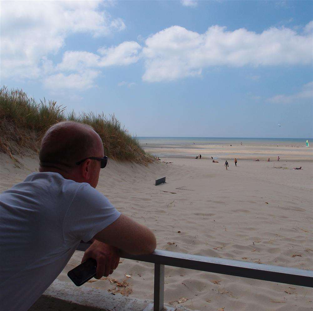 Andy enjoys the view from the Ibis Hotel on Le Touquet beach.