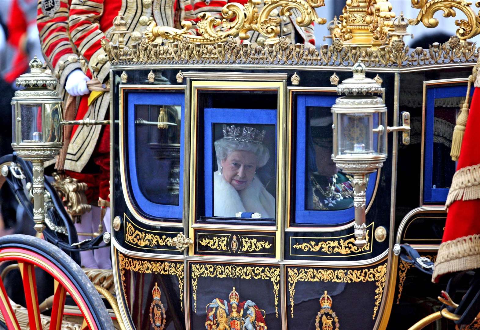 The Queen leaves Buckingham Palace for the State Opening of Parliament in 2009. Picture: Chris Radburn/PA