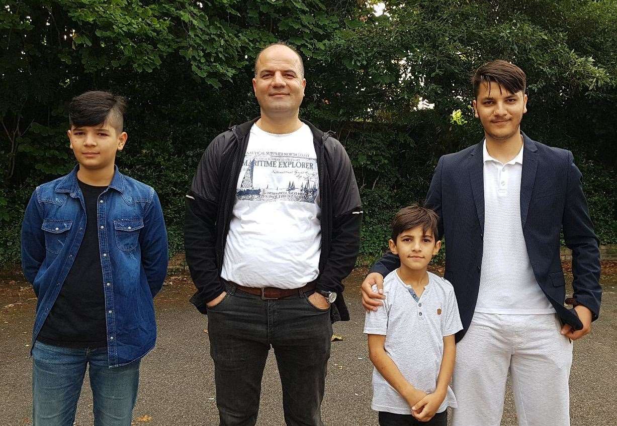 Sayed Hashemi and his sons outside Abbots Barton hotel in Canterbury