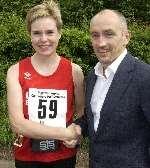 Sharon Hawkins, who won the women's race, with Barry McGuigan, who started the runners