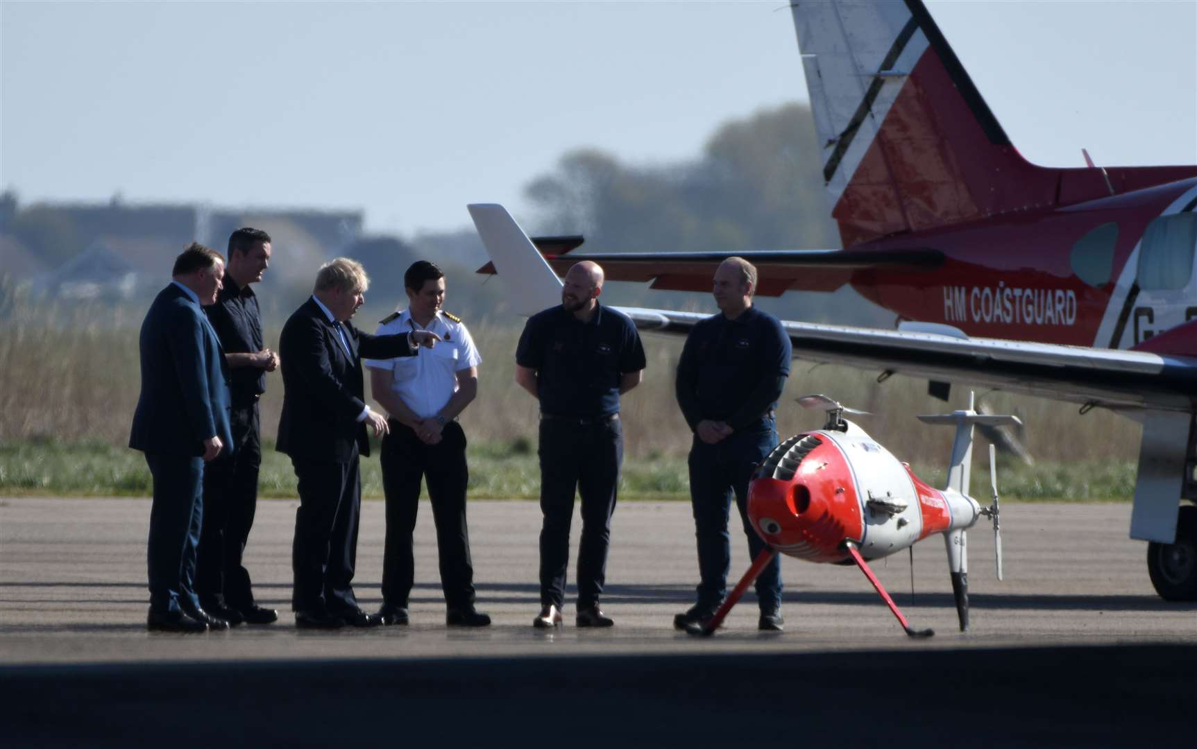 Prime Minister Boris Johnson at Lydd Airport in Kent, accompanied by Damian Collins, MP for Folkestone and Hythe. Picture: Barry Goodwin.