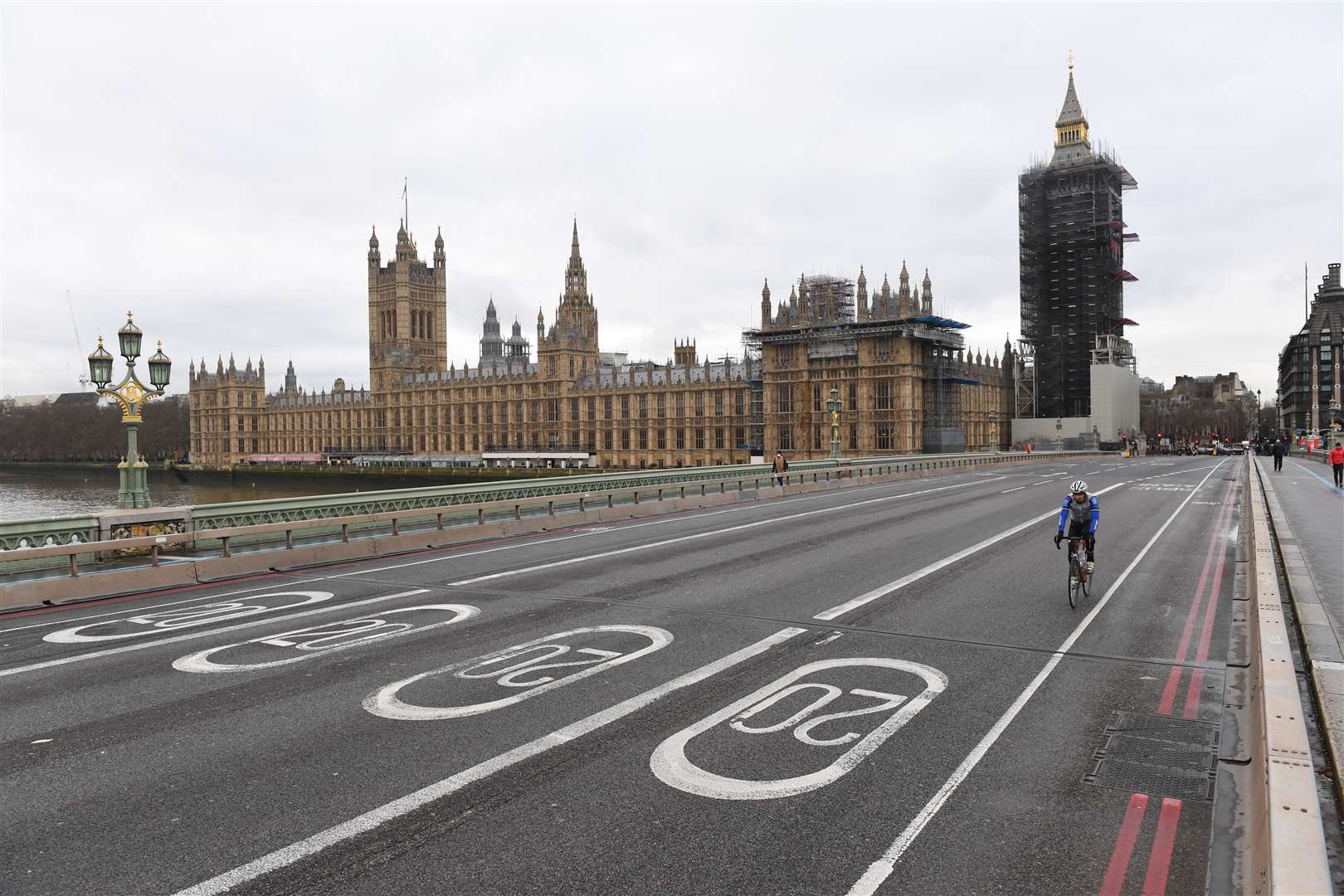 A quiet Westminster Bridge in London, where people have been advised against all but essential travel (Stefan Rousseau/PA)