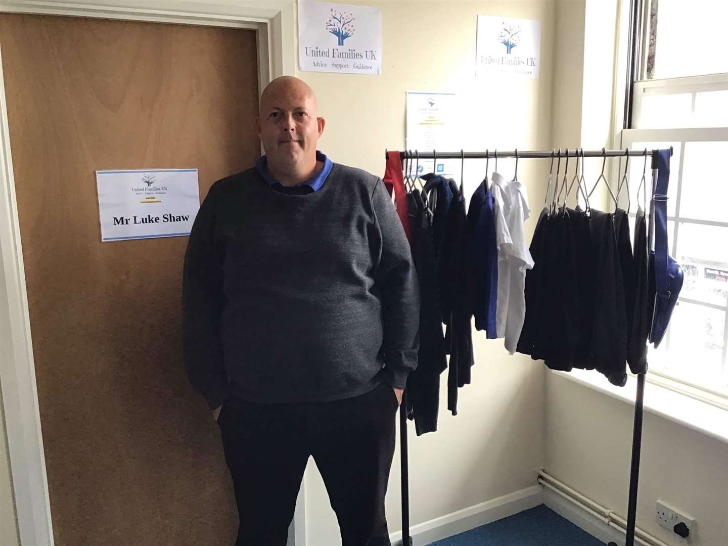 Luke Shaw, founder of United Families UK, is collecting unwanted school uniform