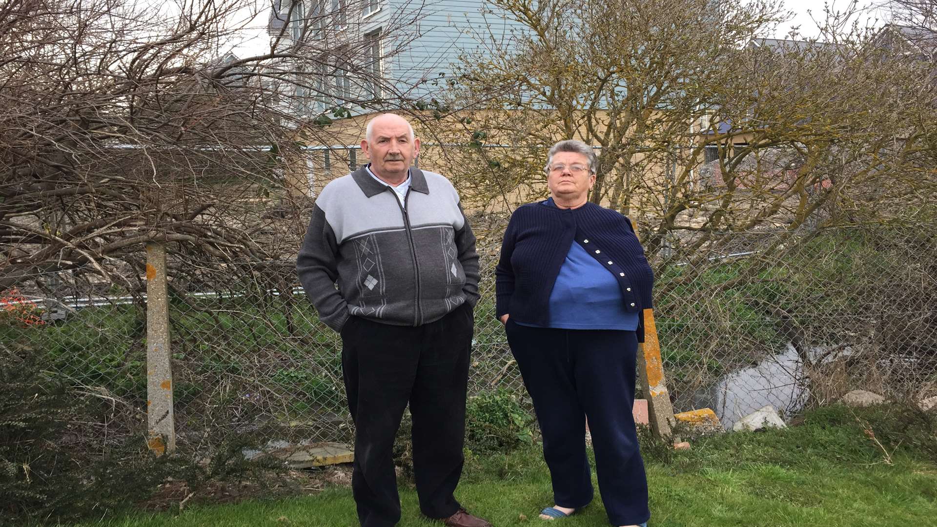 Jim and Shirley Hutchinson in their back garden which they fear could be flooded.
