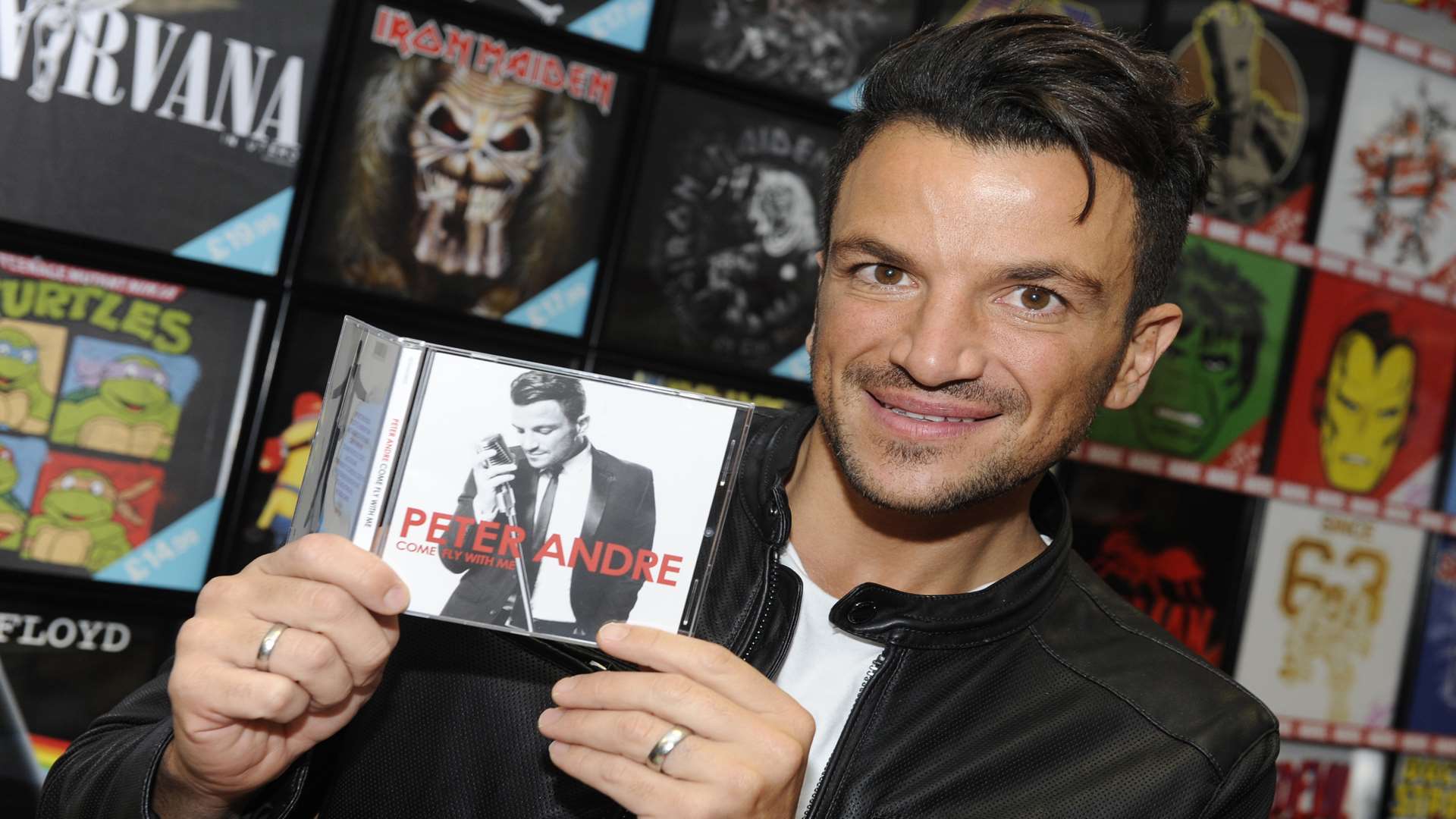 Peter Andre arrives to sign copies of his new album Come Fly With Me.