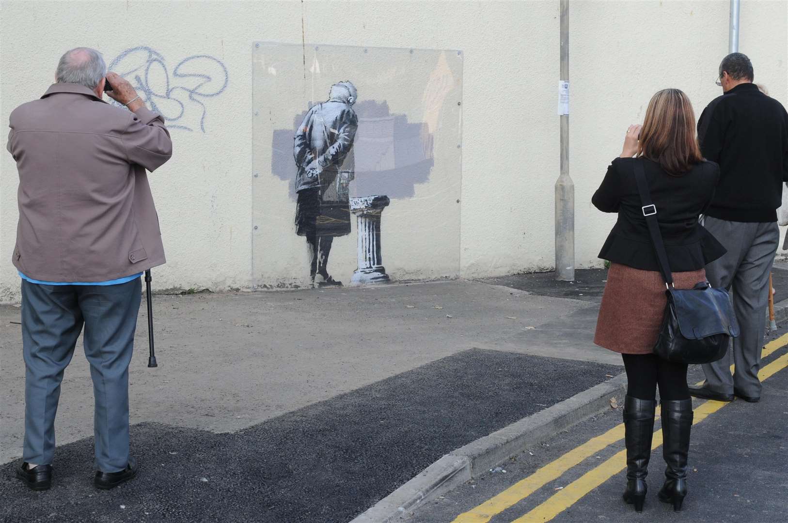 The Banksy artwork in Folkestone was given protective framing. Picture: Wayne McCabe