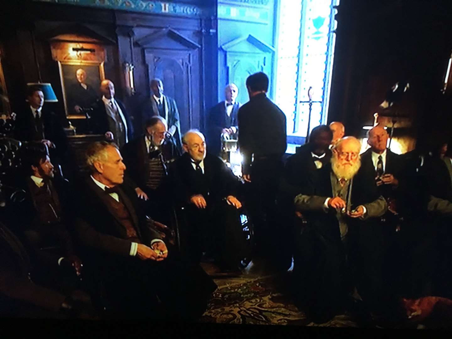 Sheppey actor Phil Goldacre, seated, as sub-rector of Jordan College, Oxford, in His Dark Materials with James McAvoy. Picture: BBC TV