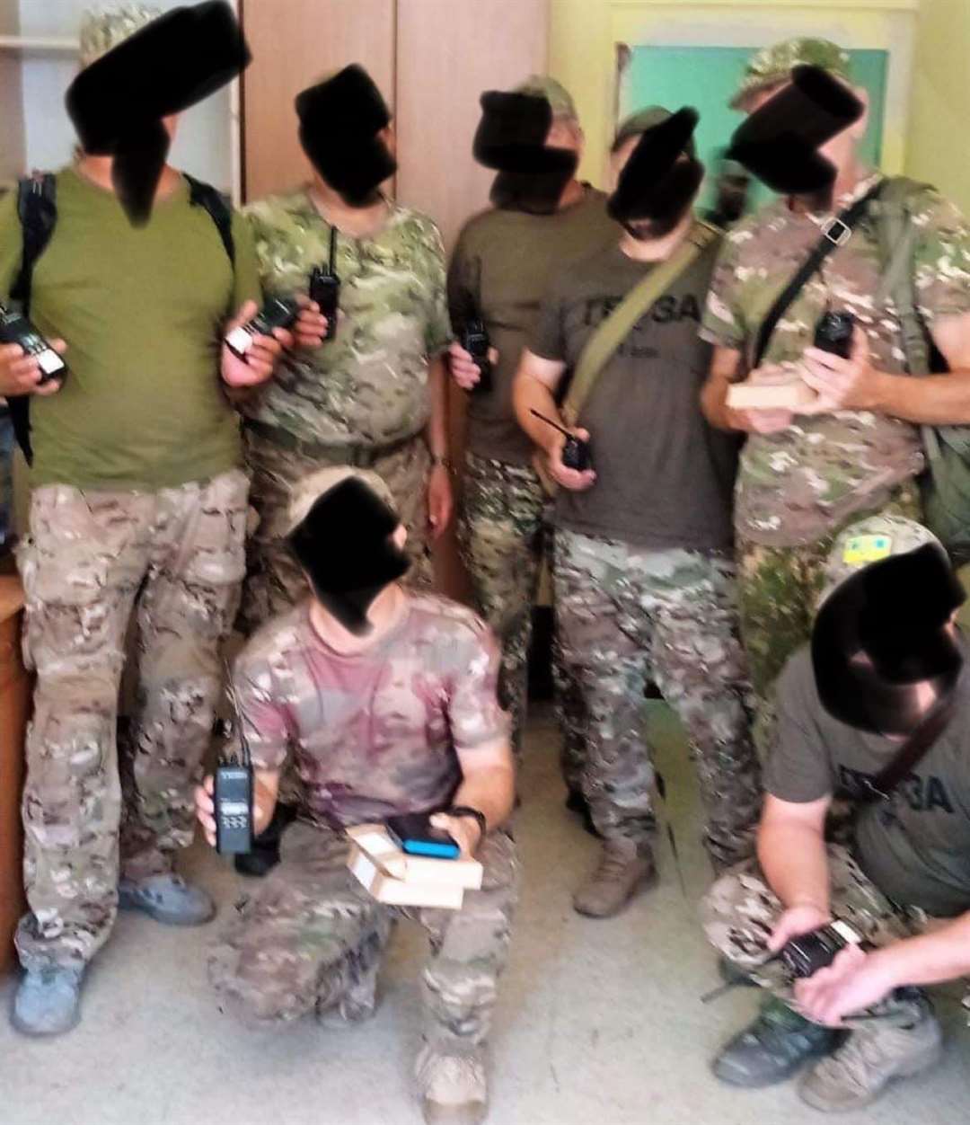 Frontline soldiers in Ukraine with revamped radios donated by Safer Medway Partnership