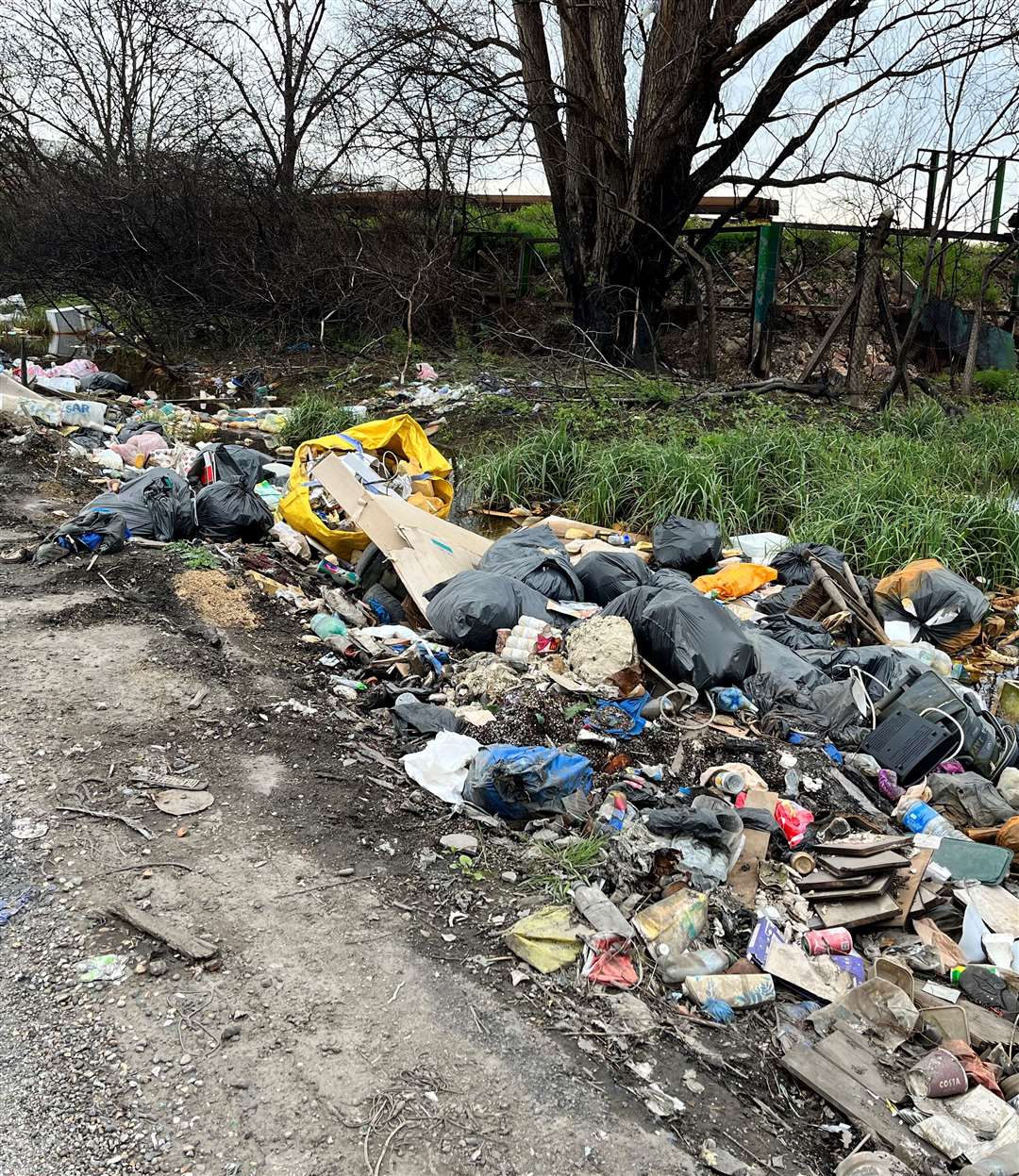 Ditches close to Dartford Composites are so full of fly-tipping they cannot help drain flood water