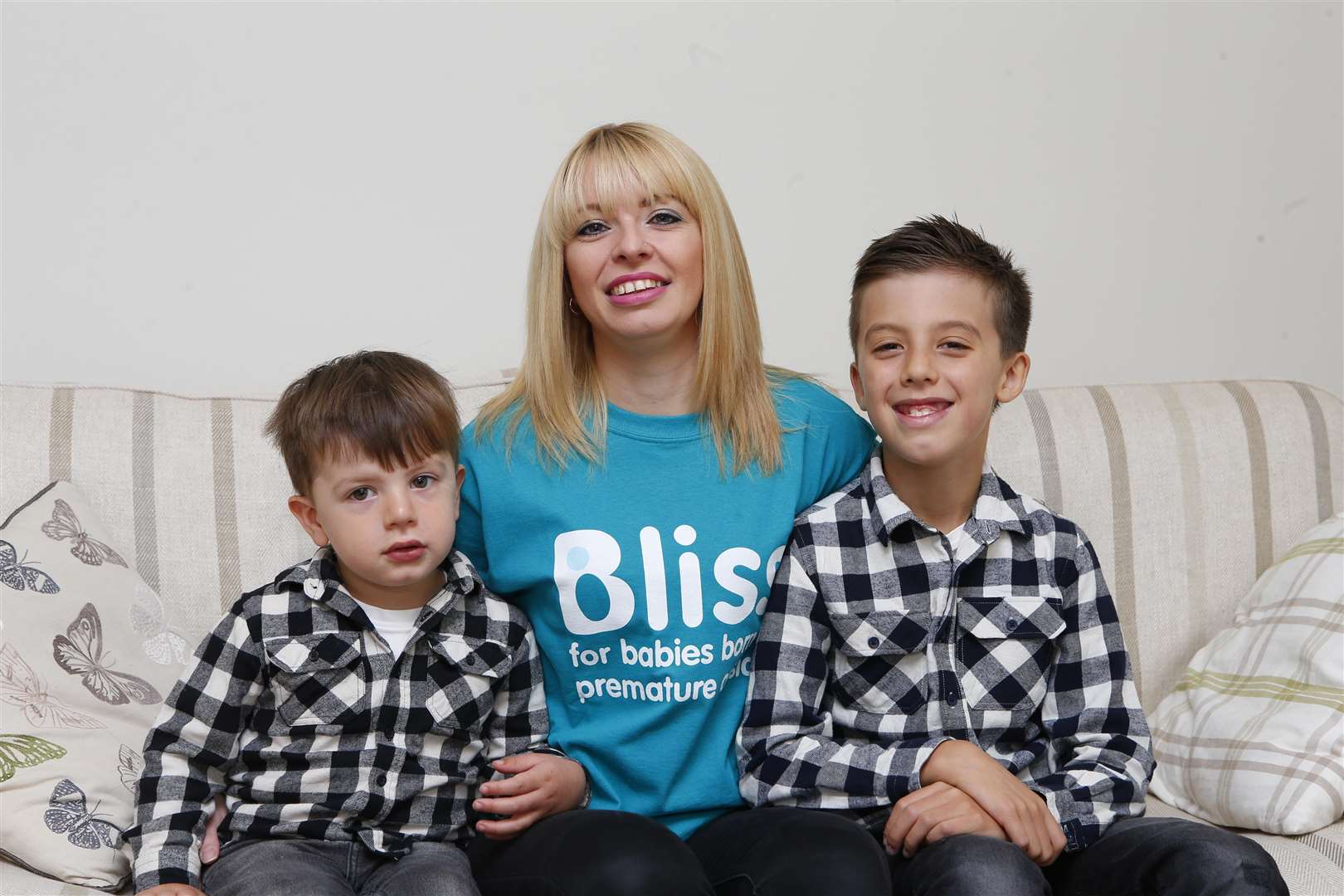 Emma Findeis with Eli, 2, Joshua, 8, who were both born prematurely