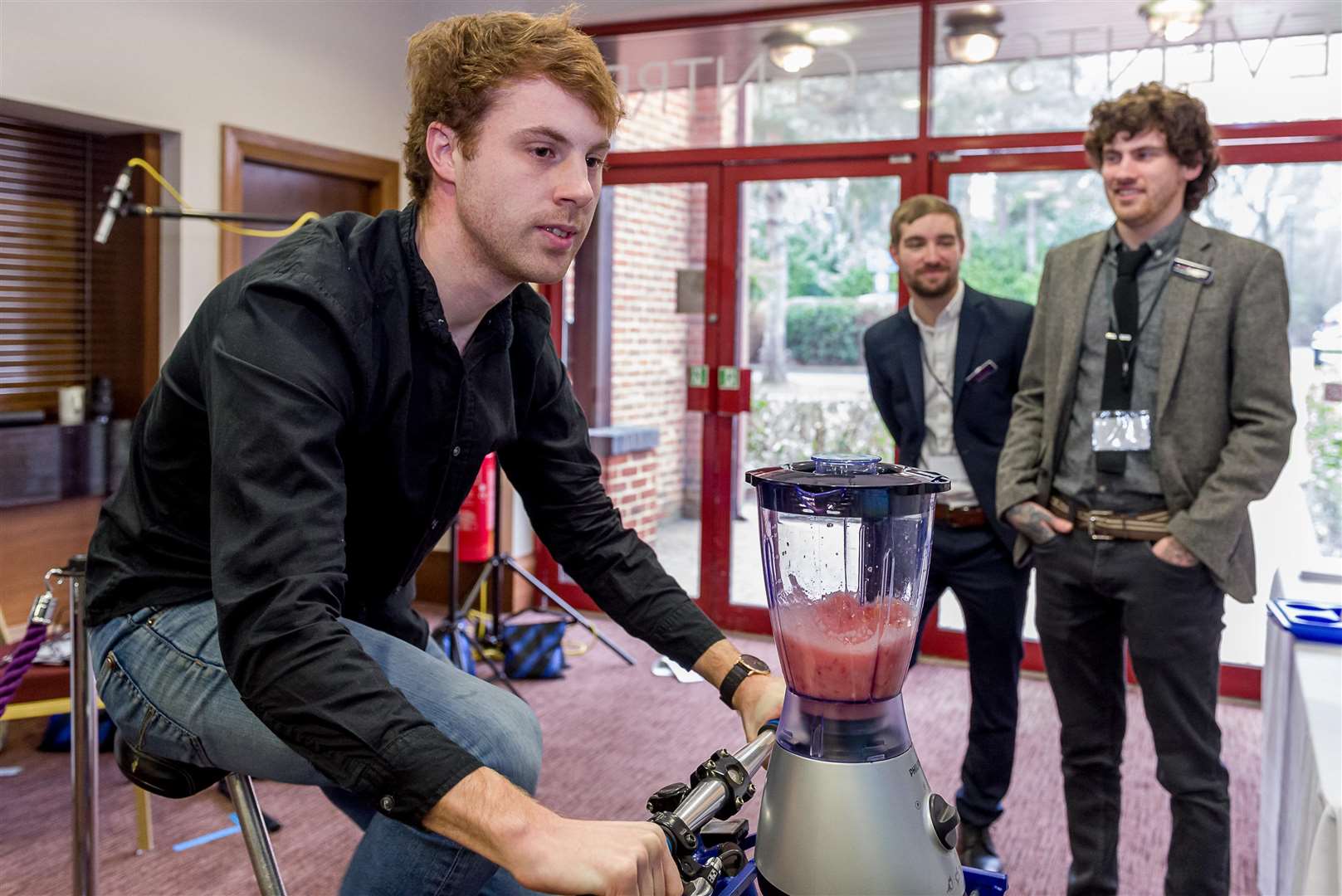 A delegate takes on the Smoothie Bike Challenge at the Wellbeing Symposium
