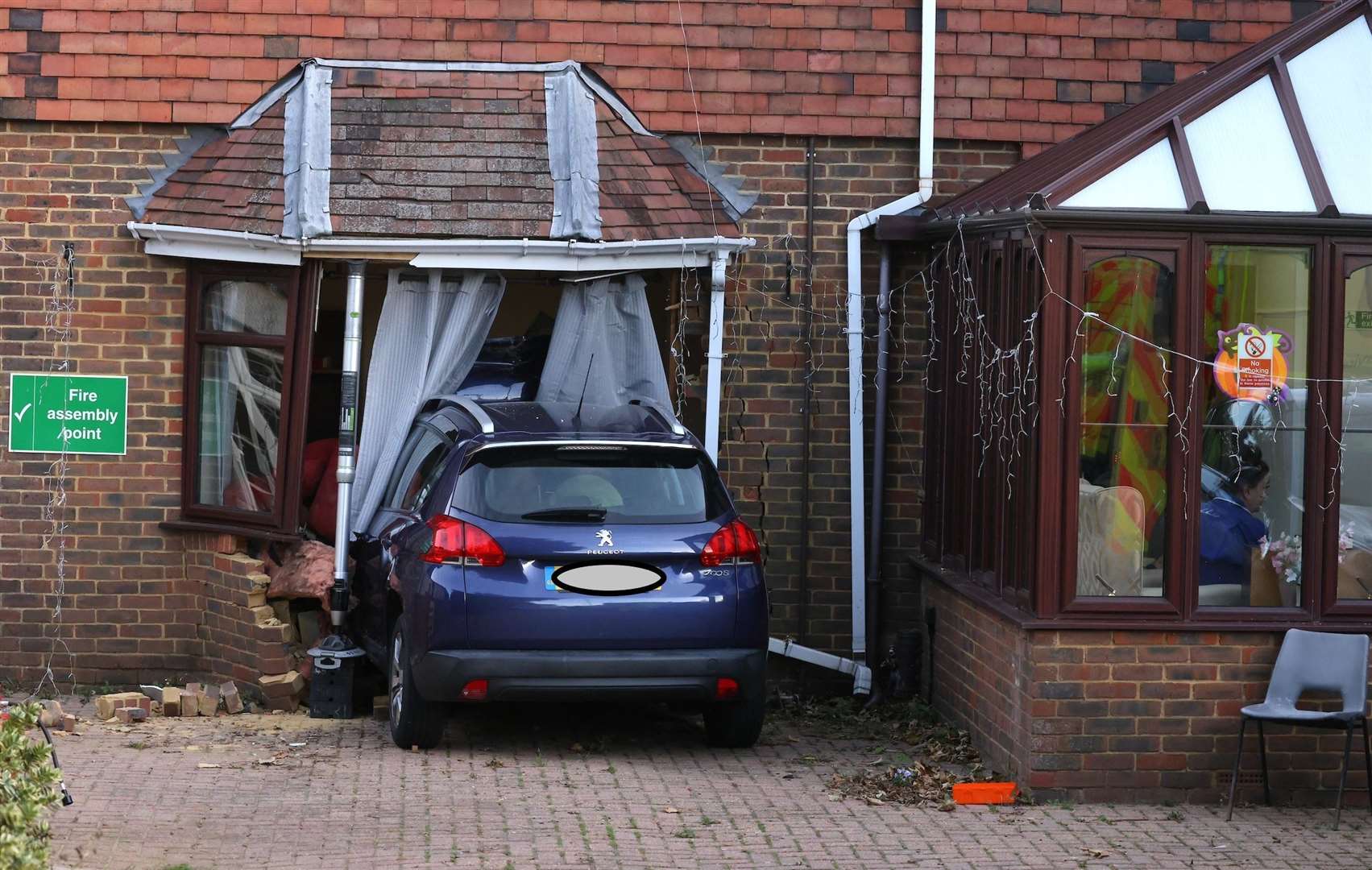Firefighters, police and paramedics outside the Hawthorn Manor care home in Gillingham where a car smashed into the front of the building. Picture: UKNIP (60296904)