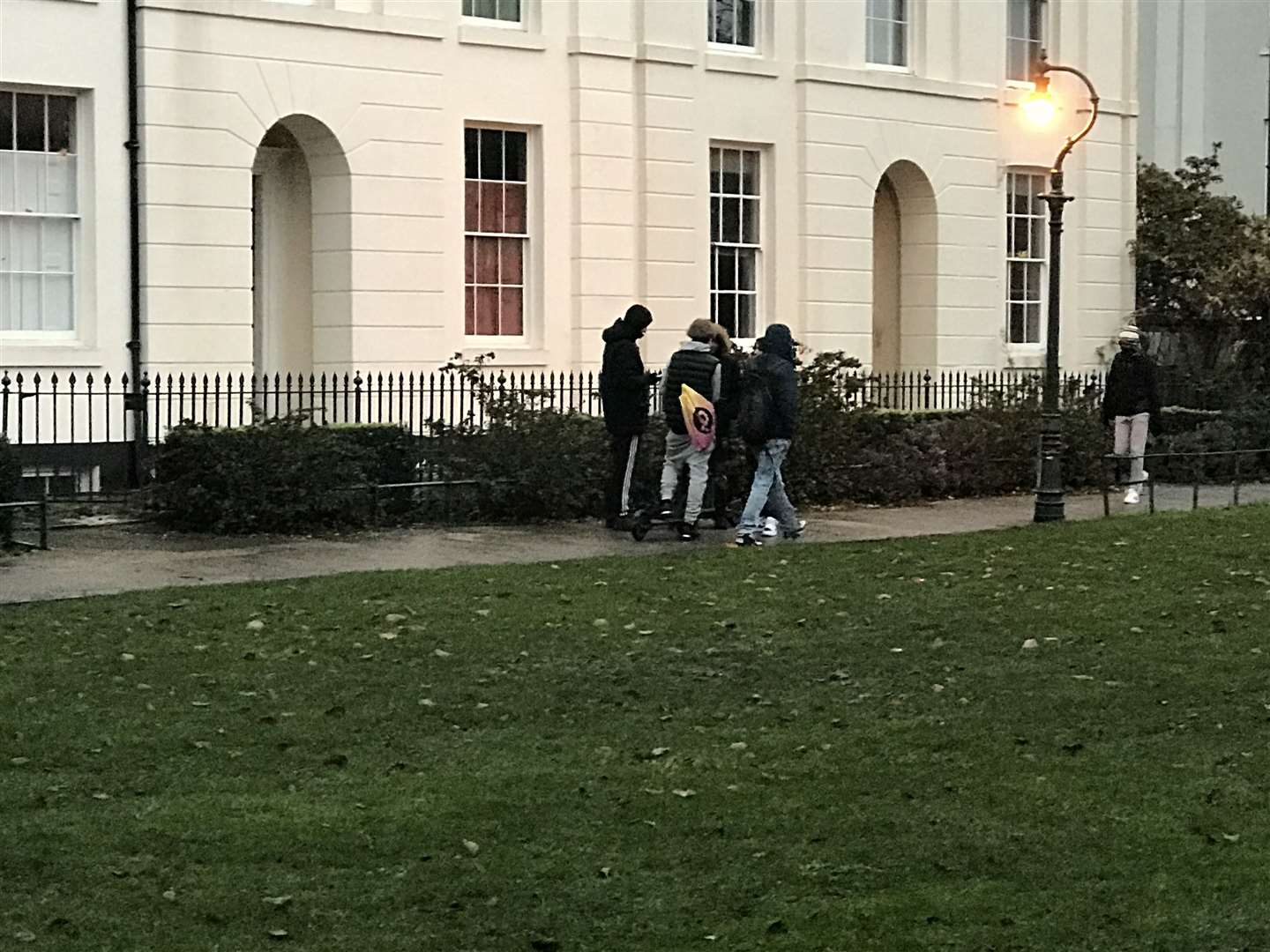 A group of e-scooter users in Dane John Gardens, Canterbury