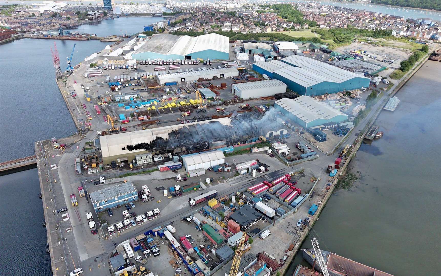 Drone images show the extent of the damage to the warehouse at Chatham Docks. Picture: @AerialimagingSE