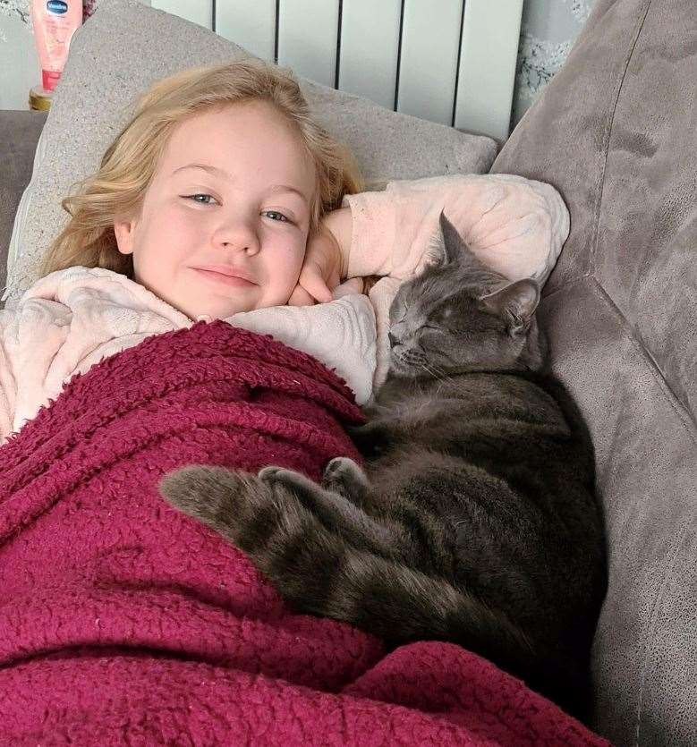 The two have been inseparable since getting Poppy as a 14-week-old kitten in October 2021