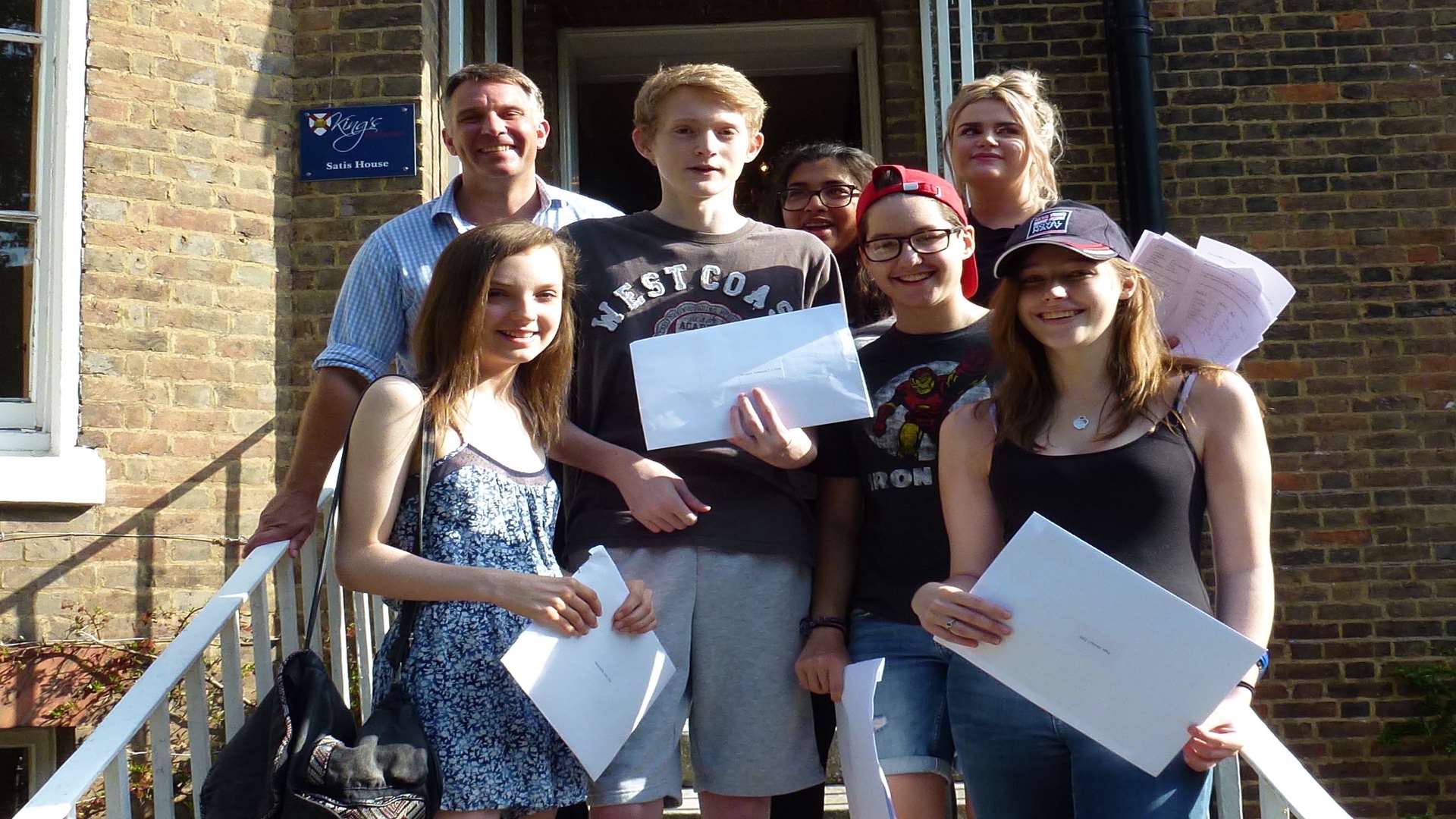 Happy GCSE pupils pick up their results at King's School, Rochester