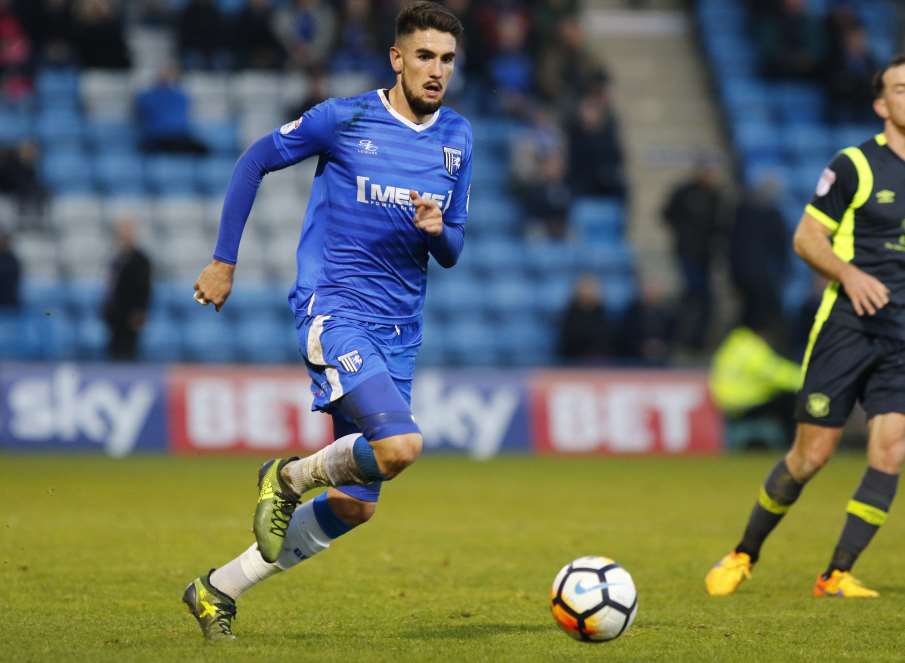 Conor Wilkinson on the ball for Gillingham against Carlisle Picture: Andy Jones