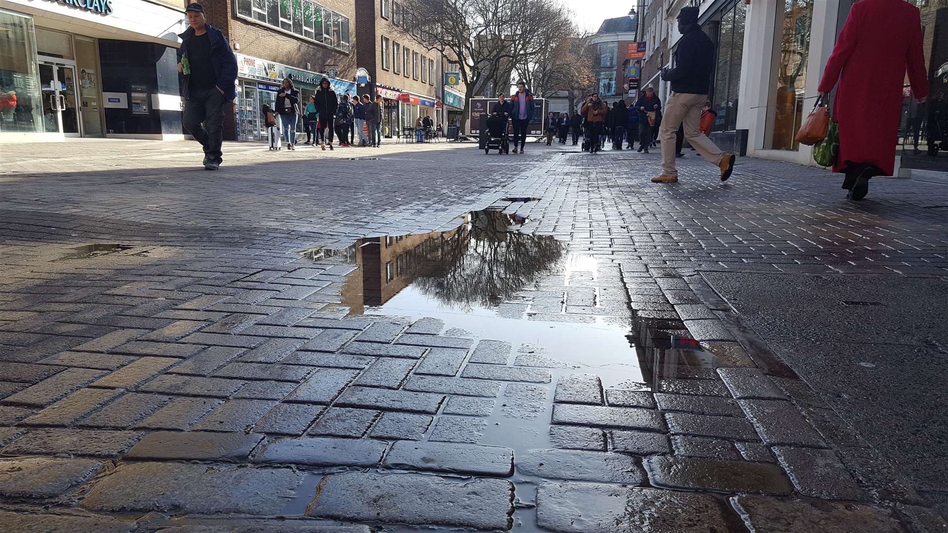 The poor surface in St George's Street urgently needs re-paving