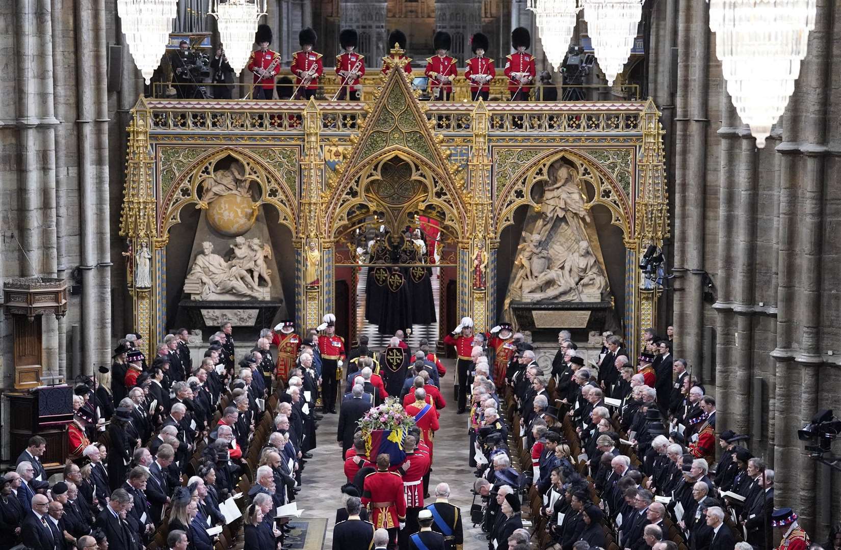 King Charles III and members of the royal family follow behind the coffin of Queen Elizabeth II. Picture: PA.