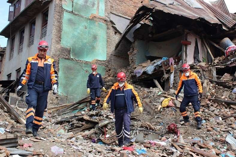 Aid workers search for earthquake survivors in Nepal. Pic from Anadolu Agency/Getty Images