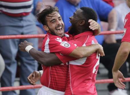 Sam Deering celebrates with Anthony Cook Picture: Martin Apps