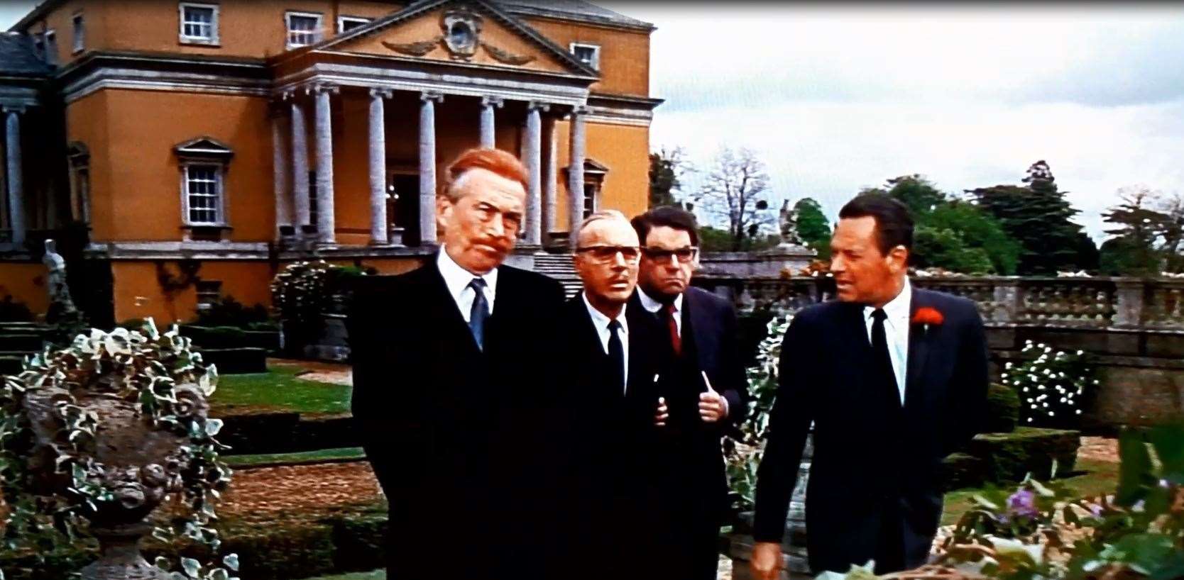 The spies at Mereworth Castle: played by John Huston, Charles Boyer, Kurt Kasznar and William Holden