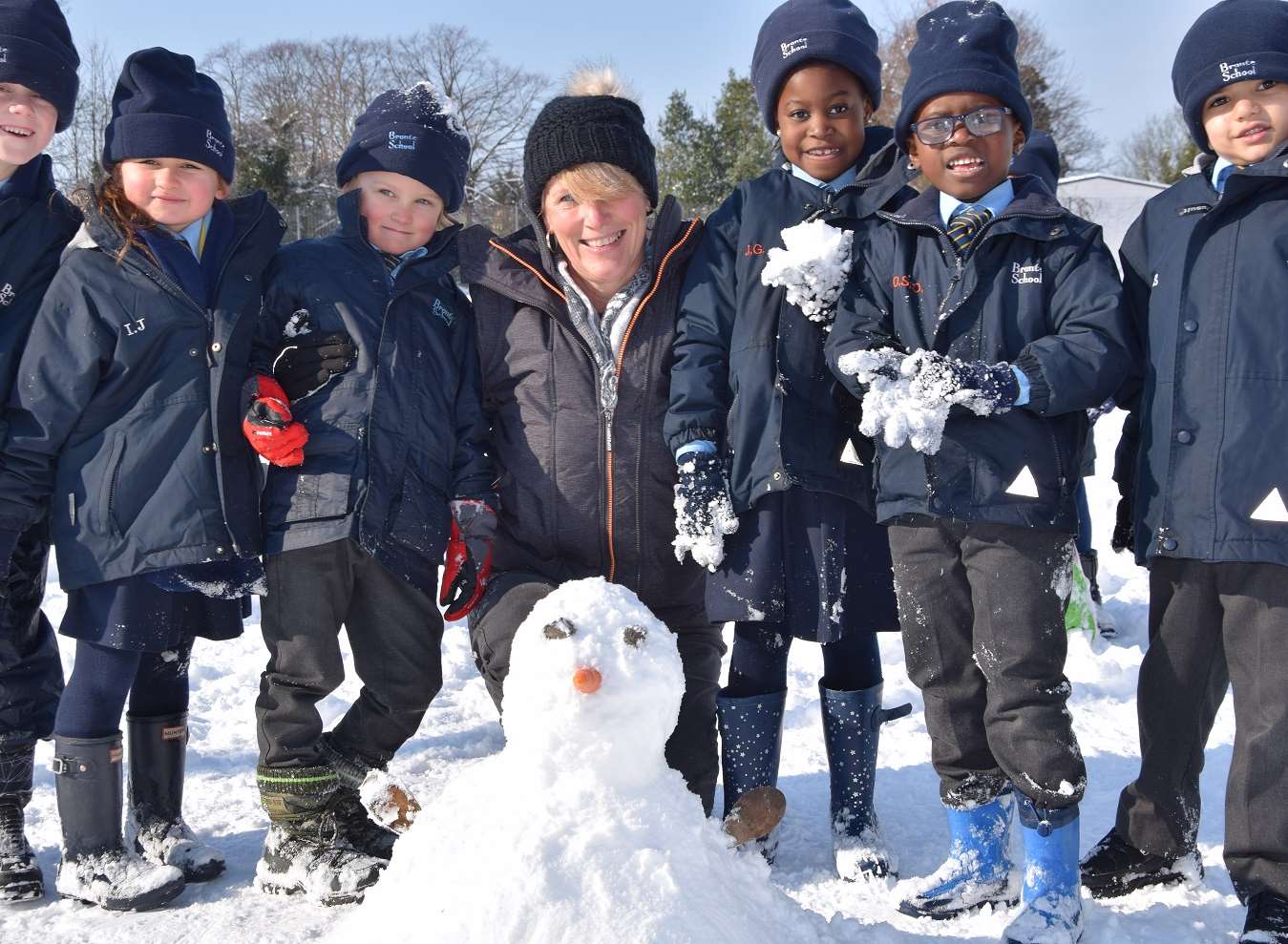 Children and staff playing in the snow at Bronte School.