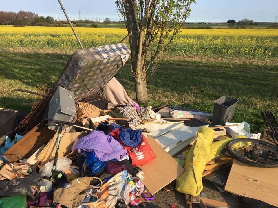It is hoped the reopening of recycling sites will see a decrease in the amount of fly-tipped rubbish, like this mound in School lane, Iwade. Picture: Hayley Dunford