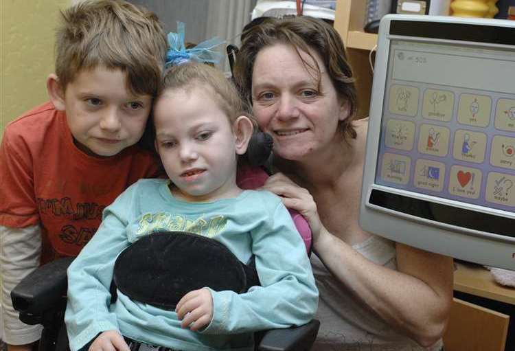 The Kent Messenger launched a campaign to raise money for a Smartbox for Elke pictured here with mum Glynnis and brother Galahad