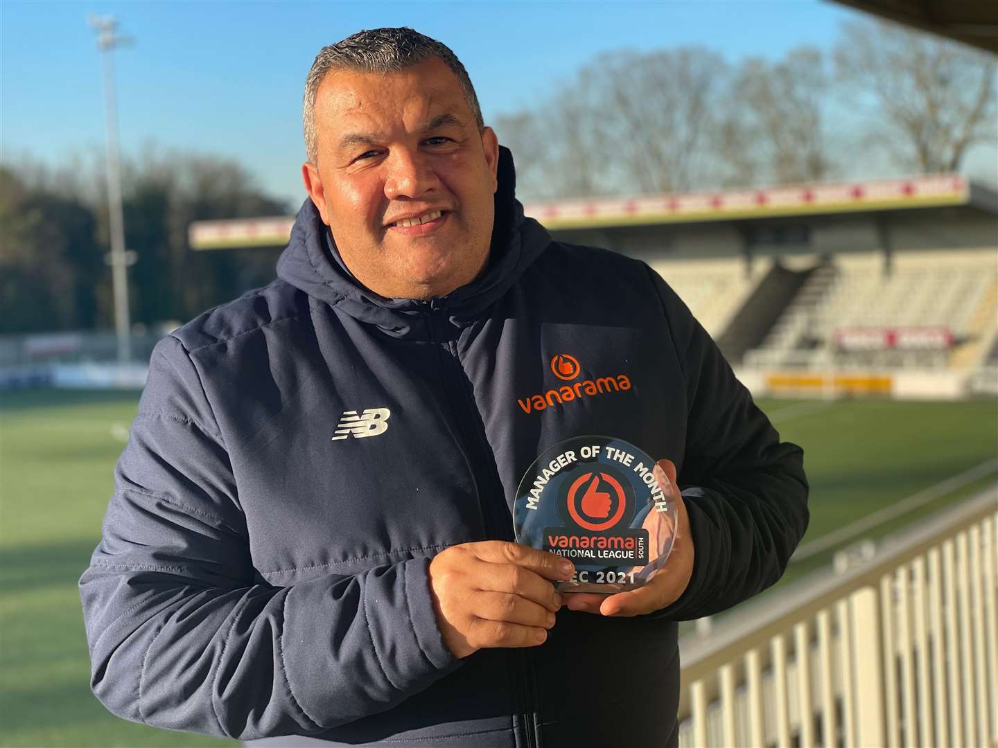Maidstone United boss Hakan Hayrettin with the December manager of the month award