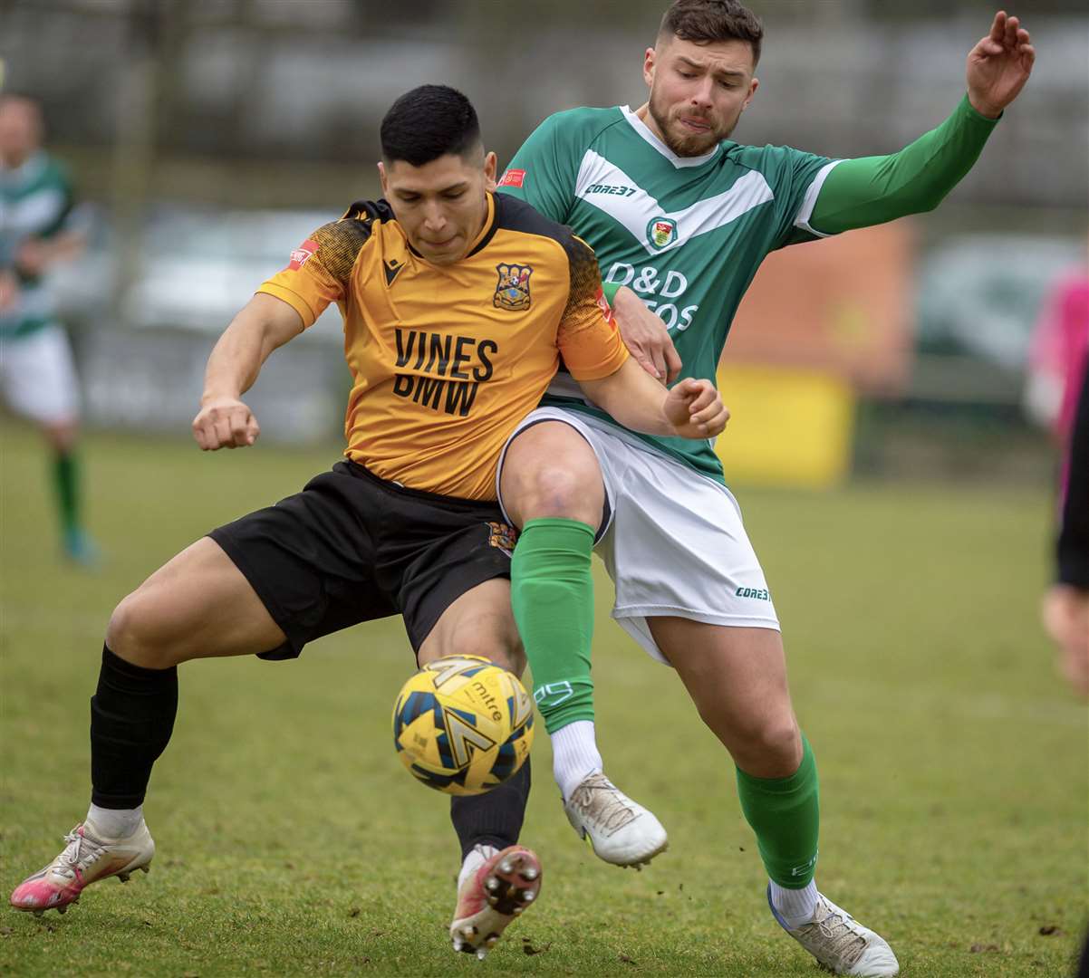 Ashford United midfielder Rob Saunders gets stuck in. Picture: Ian Scammell