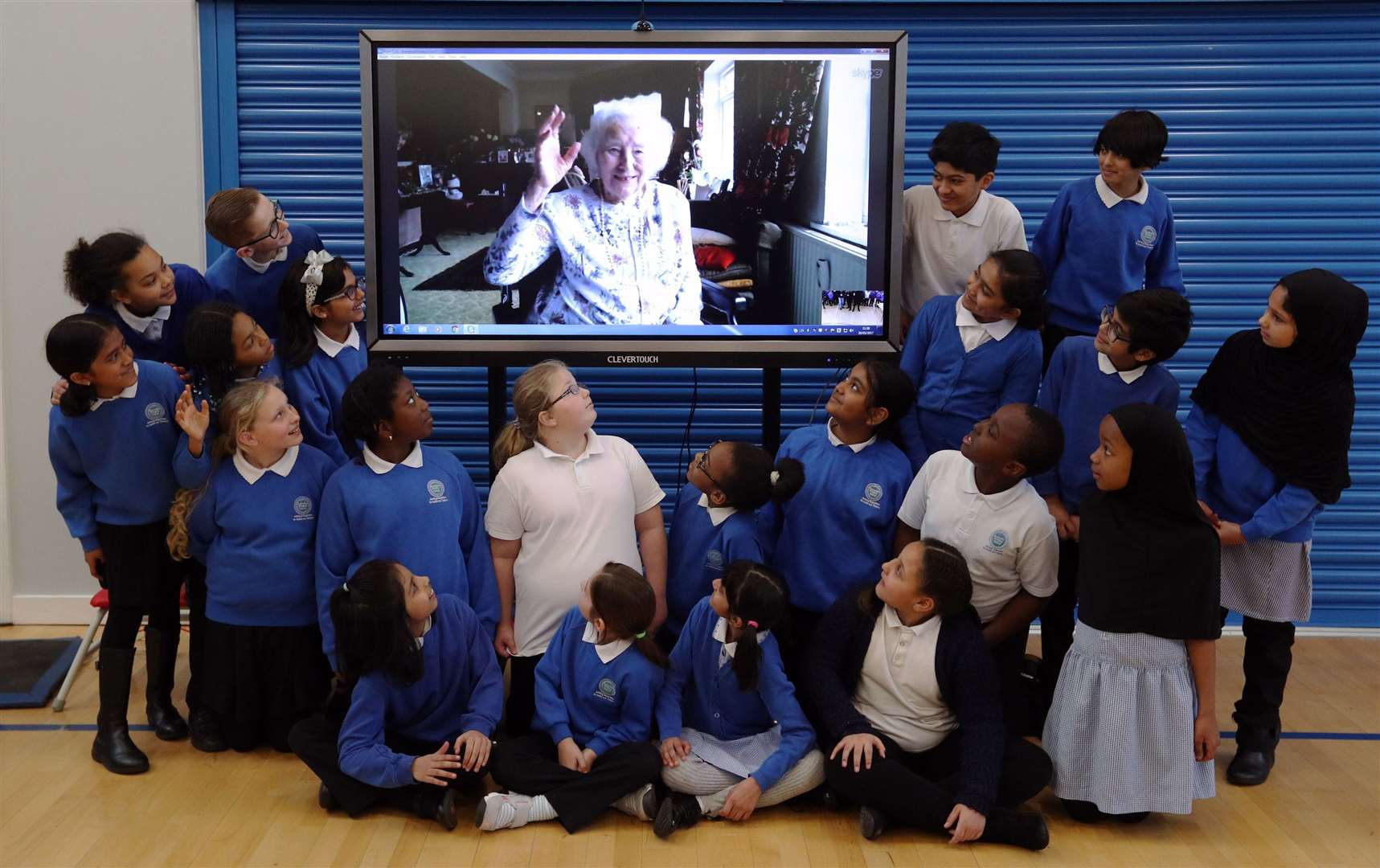 Skyping with pupils from her former east London school, Brampton Primary, on her 100th birthday (PA)