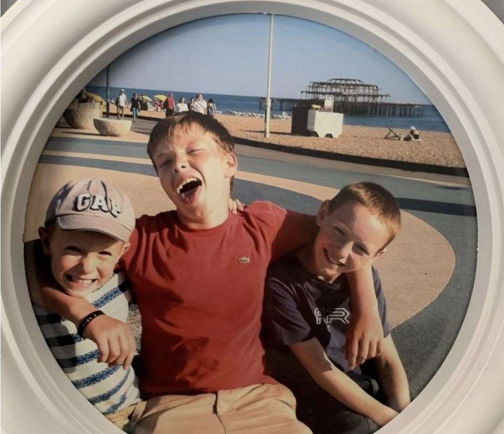Matthew Mackell with his two brothers, Christopher and Daniel. Picture: Michael Bond