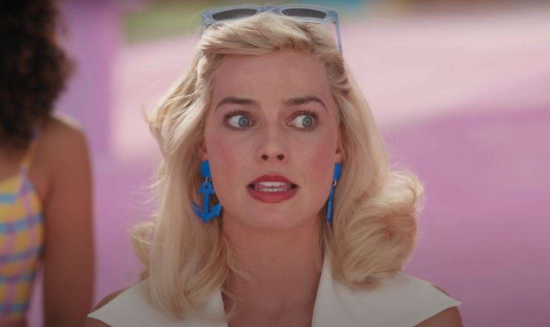 Margot Robbie as Barbie wearing Sugar & Vice’s blue anchor design. Picture: Warner Bros.