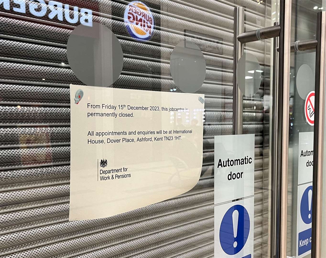 A sign on the door says the site closed on December 15