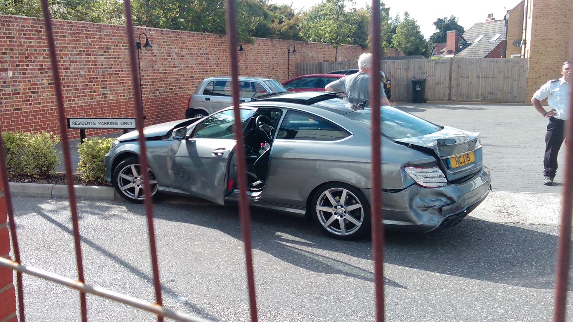A car was said to have collided with the woman, and several parked cars