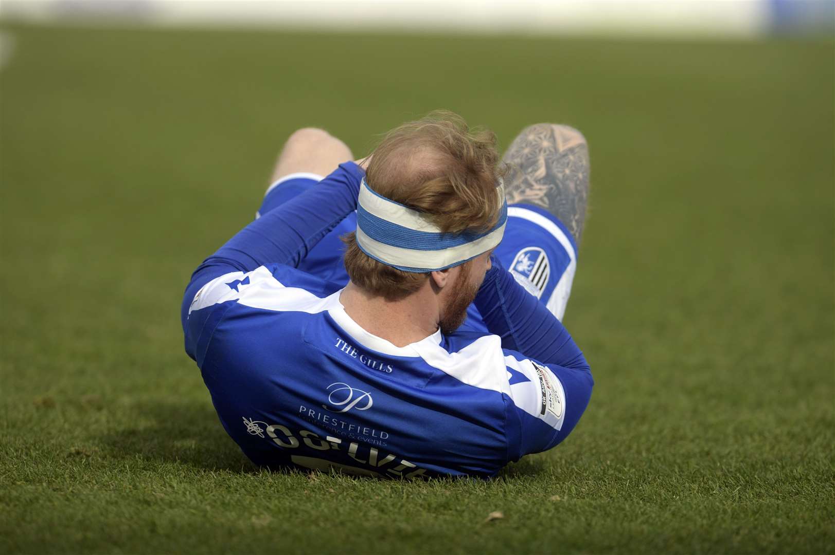 Connor Ogilvie down injured against Bristol Rovers Picture: Barry Goodwin
