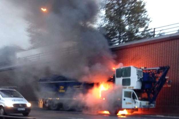 A mobile crane on fire on the M25. Picture: @Depicus