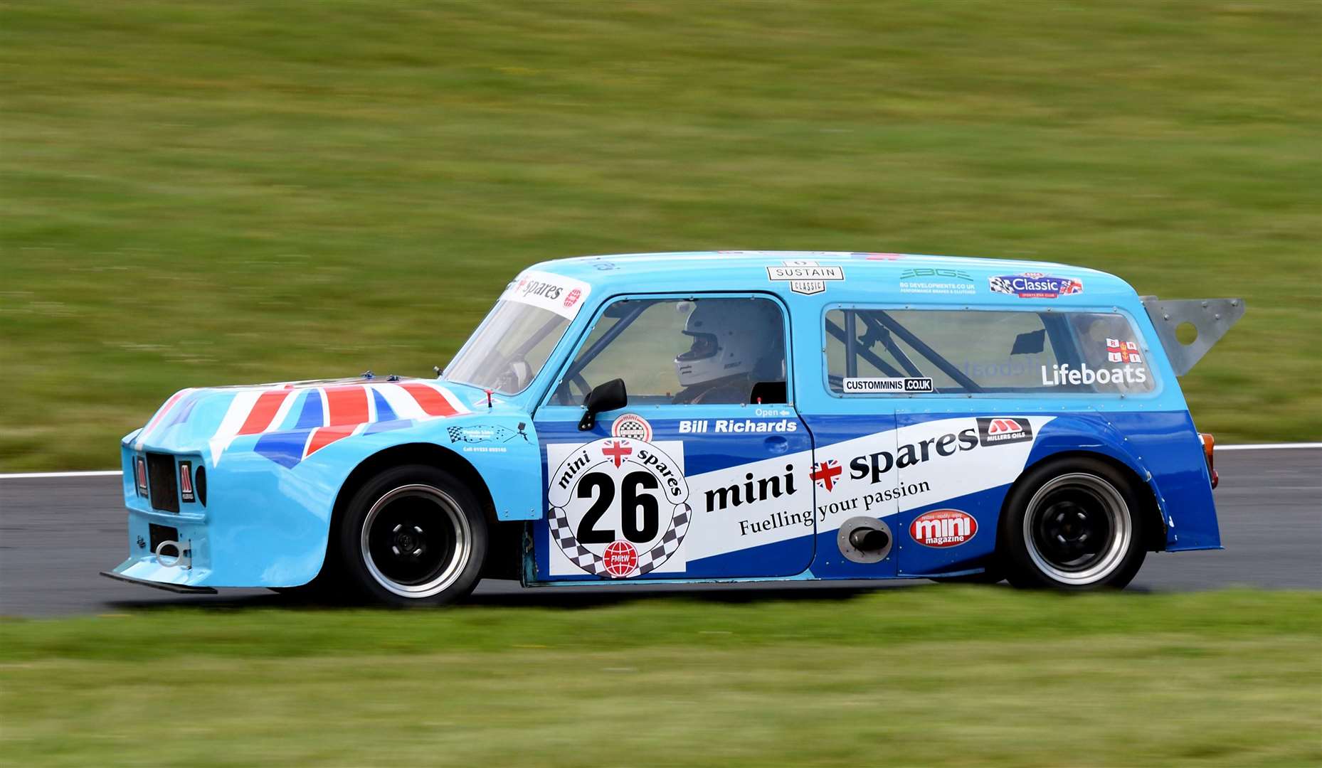 The Mini Spares-backed driver at speed in his Maguire Mini Traveller. Picture: Simon Hildrew