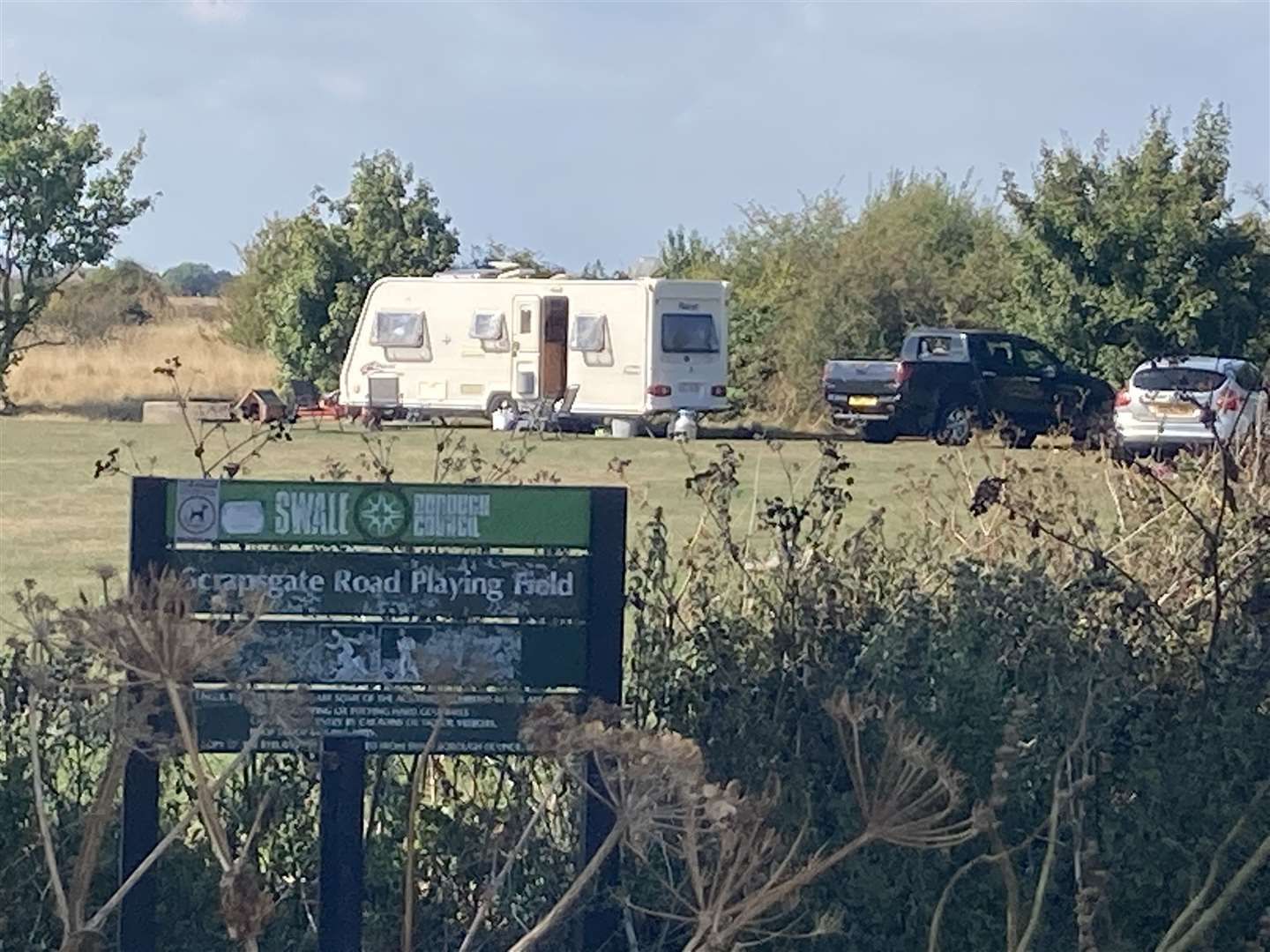 Travellers camped at Scrapsgate Road playing fields at Minster