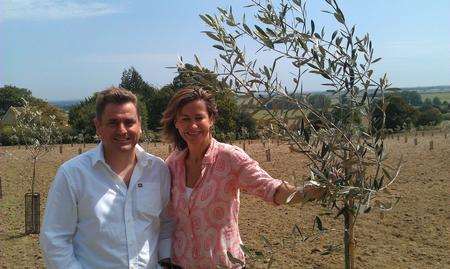Neil Davy and his wife Louise at their olive grove in Stone-in-Oxney.