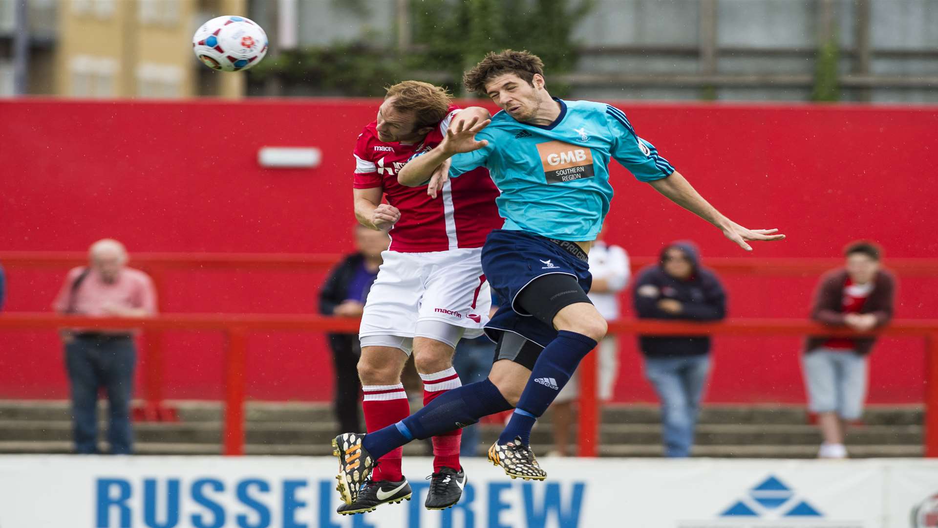 Ebbsfleet's Stuart Lewis gets up well to win this header against Whitehawk Picture: Andy Payton