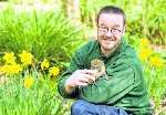 Simon Jeffery, the head of the primate section with the baby monkey