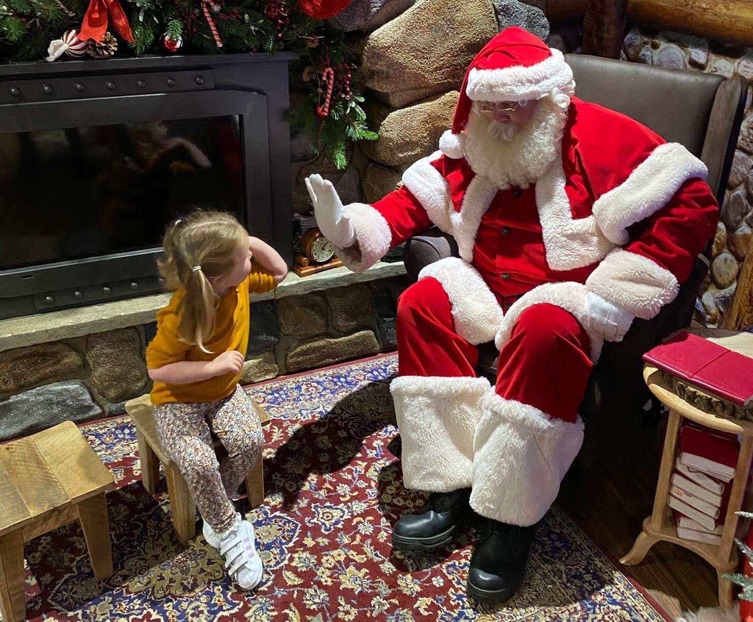 Giving Santa a high five at Hamleys