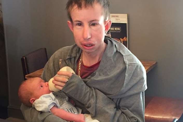 Bradley with his new nephew, Jacob