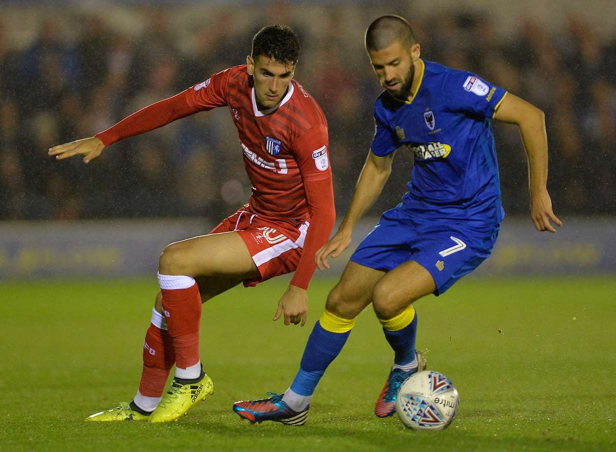 Conor Wilkinson in action at Wimbledon. The Gills striker has yet to score this season Picture: Ady Kerry