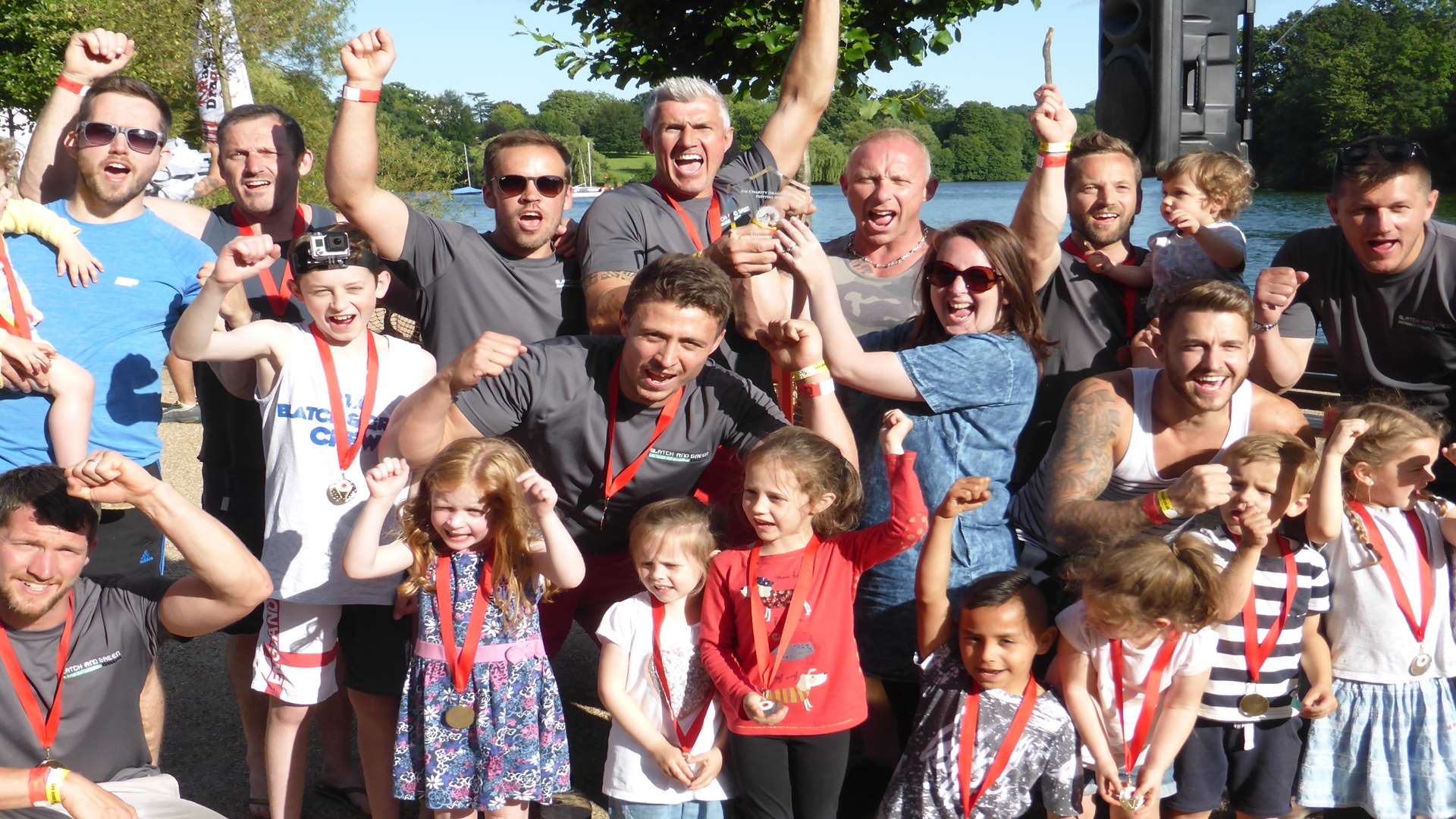Polly Viccars of Kent Reliance presents Nick Green and Whitstable teams Blatch and Green with the winners trophy for the fifth time at the record-breaking 2016 KM Dragon Boat Race.