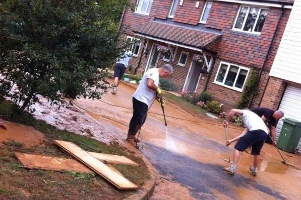 Residents of Paygate off Sutton Road spent nine hours cleaning up after flooding on Sunday